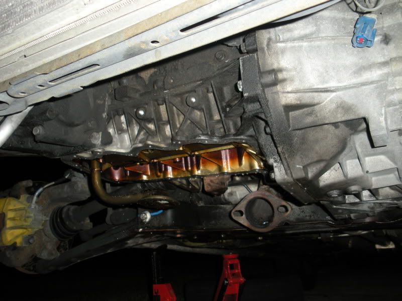 Changing oil pan gasket and took some pics, see what header wrap does